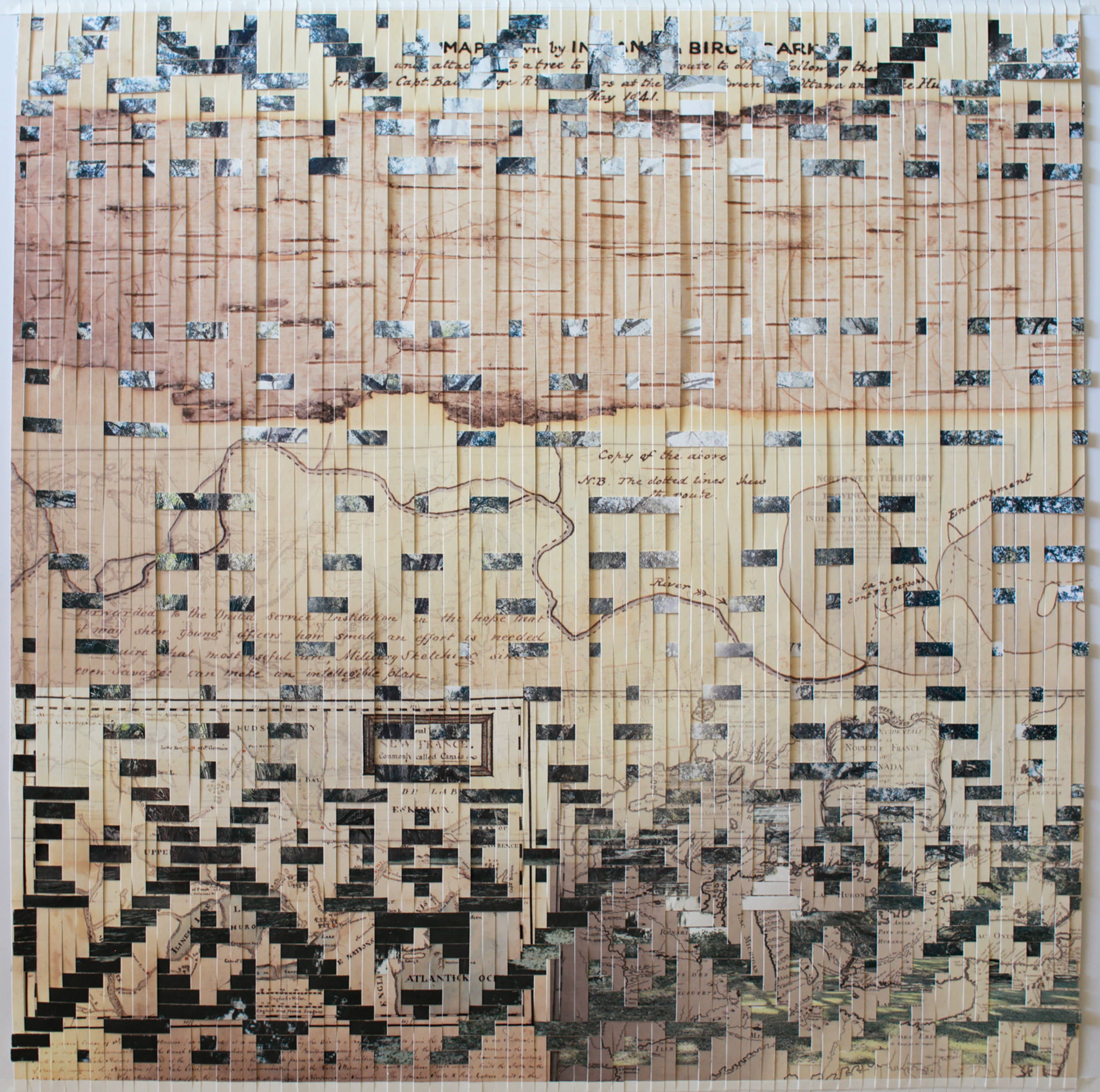 An abstract art piece that overlays angular, geometric design onto historical maps, notably the Ojibwe "kikaigon", also described and shown below. The material, from Sense’s website, includes woven archival inkjet prints on Hahnemuhle bamboo paper. While the geometric patterns take visual precedence, the background complicates the rigid angles through the fluid landmarks–like rivers, mountains, and footpaths–from the maps, as well as the scripted annotations of many of these geographical features. In turn, the text and illustrations on the maps are predominately obscured by the geometric patterns. Through the angular shapes, granular images of shapes appear, such as tree branches, rocks, dirt, and grass.